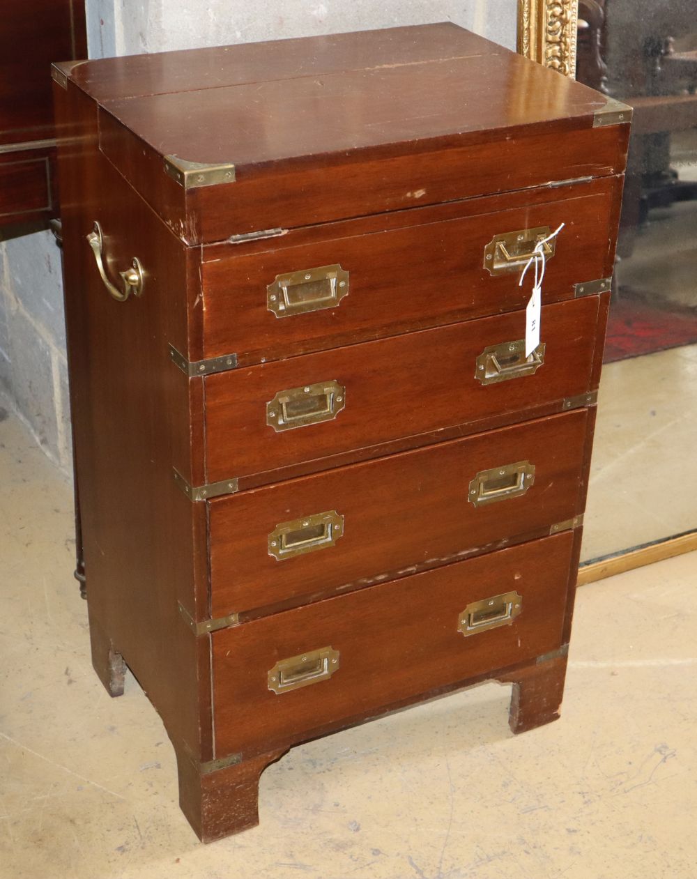 A reproduction military style brass mounted mahogany writing cabinet, W.51cm, D.38cm, H.82cm